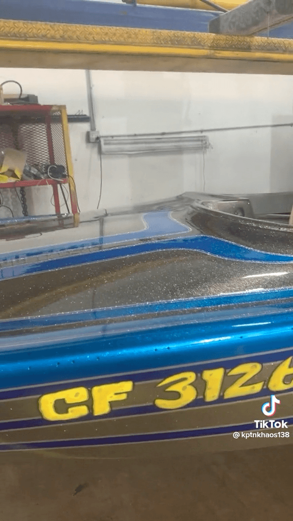 Tamco Paint Slick Silver Metallic and Candy Concentrates on Boat Hull