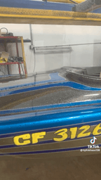 Tamco Paint Slick Silver Metallic and Candy Concentrates on Boat Hull