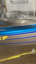 Tamco Paint Slick Silver Metallic and Candy Concentrates on Boat Hull