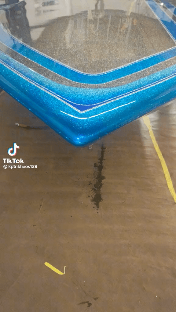 Tamco Paint Slick Silver Metallic and Candy Concentrates on Boat Hull
