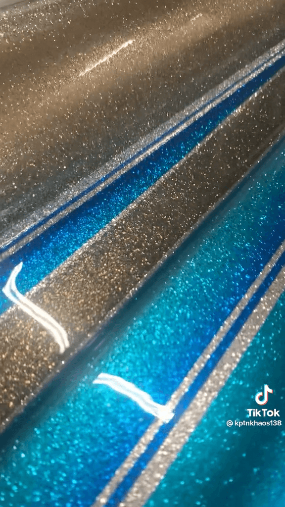 Tamco Paint Slick Silver Metallic and Candy Concentrates on Boat Hull