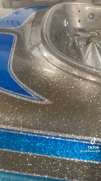 Tamco Paint Slick Silver Metallic and Candy Concentrates on Boat Hull