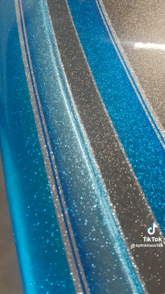 Tamco Paint Slick Silver Metallic and Candy Concentrates on Boat Hull